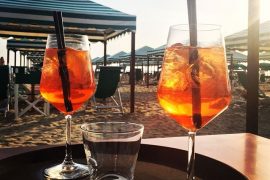Geniet van een aperol aan de italiaanse kust. Tips van Italian Residence